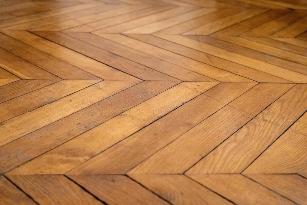 Elevate Your Space with Timeless Elegance: The Allure of Chevron Parquet Flooring